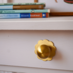 plank-hardware-cabinetry-ada-scallop-knob-backplate-brass-30980379639906