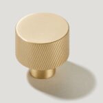 plank-hardware-handles-knobs-swift-swirl-knob-brass-28402360549474